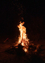 Burning night bonfire in the mountains.