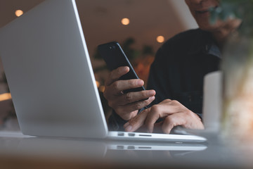 Working in coffee shop working space