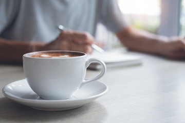Cup of coffee on table