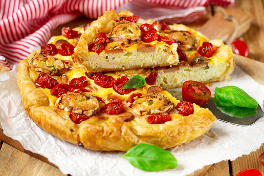 Savoury Pastry Quiche With Cottage Cheese, Cherry Tomatoes And Goat Cheese