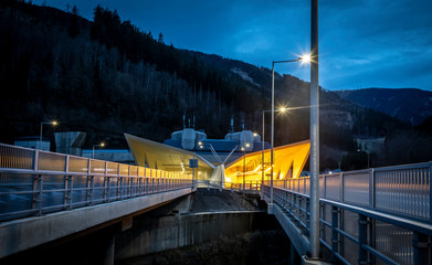 illuminated freeway tunnel portal on highway A9 named gleinalmtunnel in styria, austria