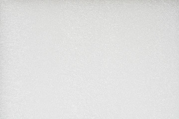 White shockproof foam board, close up shot. Synthetic textured background.  Abstract texture of expanded polyethylene transportation & packaging shockproofing foam sheet with air bubbles.