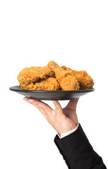hand holding a plate of fried chicken i