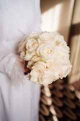 Wedding. bouquet of white roses for the bride. 
