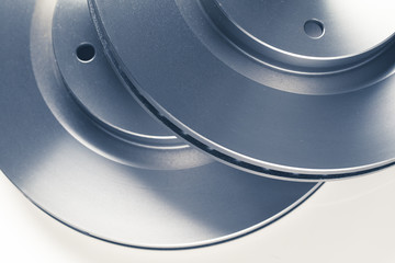 car brake discs on white background