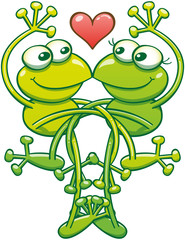 Green frogs having a lot of pleasure in a romantic encounter. They're keeping balance while intertwining arms and legs, smiling, staring at each other and showing a red heart above their heads