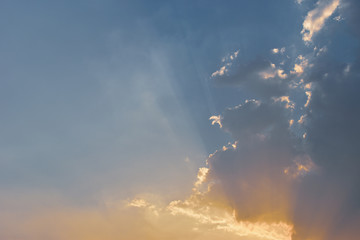 golden light rays of sunset sky background