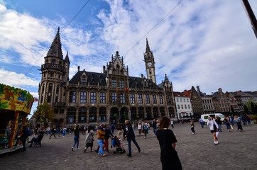 Obraz premium Ghent, Belgium, August 2019. Magnificent buildings overlook the streets of the historic center. People on the street.