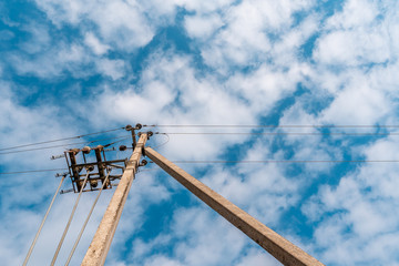 Power lines on sky background
