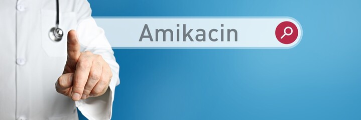 Amikacin. Arzt im Kittel zeigt mit dem Finger auf ein Suchfeld. Das Wort Amikacin steht im Fokus. Symbol für Krankheit, Gesundheit, Medizin