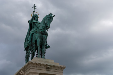 Fototapeta na wymiar St Stephen statue in front of Matthias Church historical building in Budapest