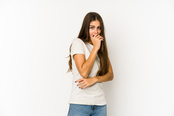 Young caucasian woman isolated on white background scared and afraid.