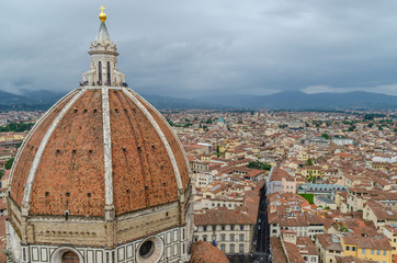 Fototapeta na wymiar Amazing view of Duomo Cathedral of Santa Maria del Fiore from Campanile di Giotto bell tower in Florence Italy