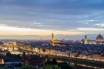Fototapeta na wymiar Amazing view of Florence during sunset with Palazzo Vecchio tower in the background in Florence Italy