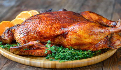 Baked duck on wooden tray