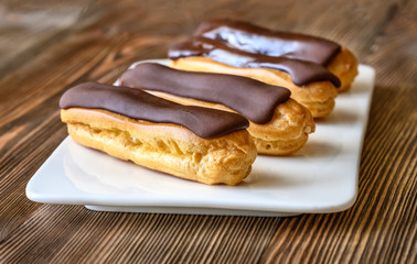 Eclairs with chocolate topping