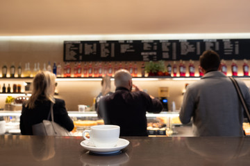 closeup of a cup of coffee at coffee shop