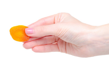 Dried apricots healthy sweet food in hand on white background isolation