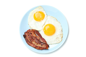 Plate with fried eggs and bacon isolated on white background
