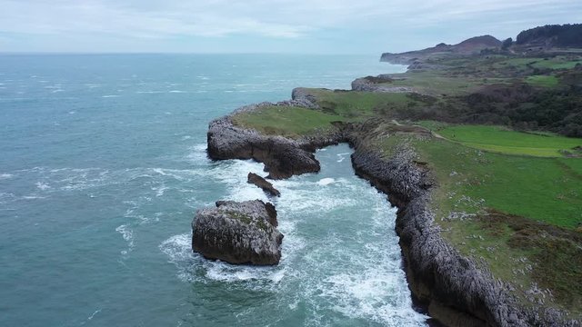Drone view of El Picon, Aerial view of Buelna Beach, Asturias, Spain, Europe