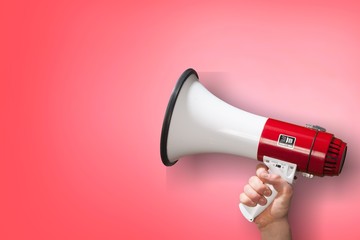 Human hand hold the classic megaphone