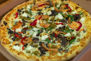 Tasty pizza with cheese and vegetables