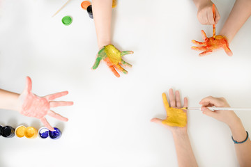 Close up photo of child who paint