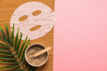 Natural skin care products at home. Gray clay in a bowl mask cloth sponge from natural environmentally friendly material