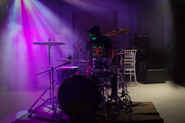 Fototapeta na wymiar A drummer show his laser light show