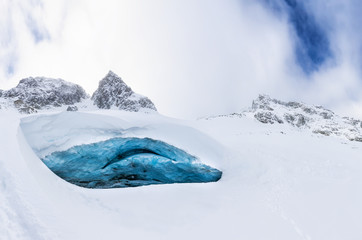 Beautiful Panoramic Vibrant Blue Colors inside the Ice Cave during a cold winter day. Taken on Blackcomb Mountain, Whistler, British Columbia, Canada. Panorama. Natural Colorful Background