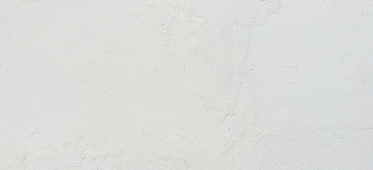 Abstract grunge white painted stucco wall texture background with copy space