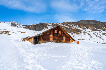 Winter landscape on the First mountain in Swiss Alps, Grindelwald ski resort, Switzerland