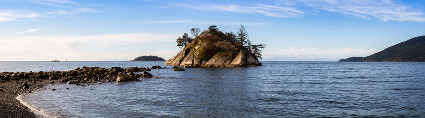 Fototapeta na wymiar Horseshoe Bay, West Vancouver, British Columbia, Canada. Beautiful Panoramic Canadian Landscape View of a Rocky Island on Pacific West Coast in Whytecliff Park during sunny winter day. Panorama