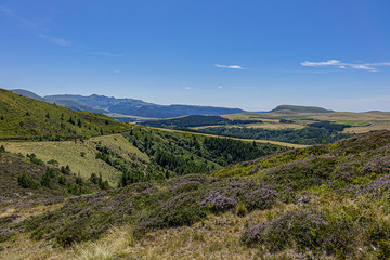 Fototapeta na wymiar Beautiful highland landscapes in Volcans d'Auvergne regional Natural Park. Monts Dore - the heart of the Massif Central, Auvergne-Rhone-Alpes administrative region, France.