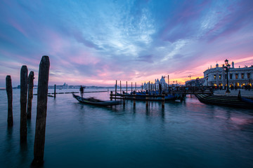 Fototapeta premium gondola in a river of Venice at sunset