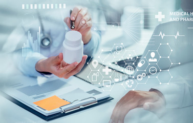 Obraz na płótnie Canvas Double exposure of healthcare And Medicine concept. Doctor and modern virtual screen interface.
