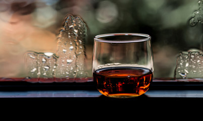 Cheers clinking of friends in party. Whisky In A Glass. Light Bokeh Background. 	