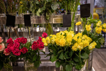 Showcase flower shop. Beautiful yellow and red roses