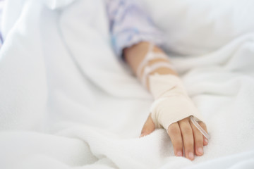 hand of Little girl was sick in hospital room,selective focus , selective focus