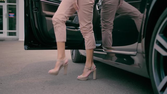 Blond Girl Exits from black car