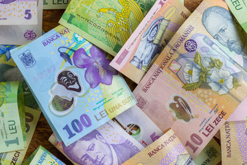 Different romanian banknotes, 1-5-10-100 RON.