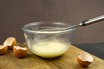 Whisk eggs to make omelette