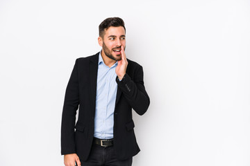 Young caucasian business man against a white background isolated is saying a secret hot braking...