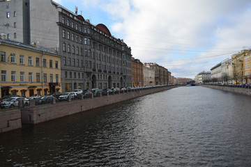 Fototapeta na wymiar cityscape, view of the river from the bridge, the channel