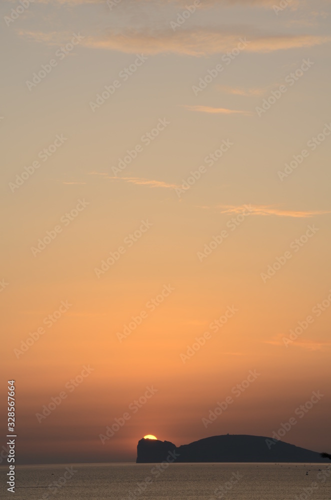 Wall mural sunset at capo caccia, alghero, sardinia, italy