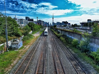 GO Train departing Toronto on a sunny summer day.