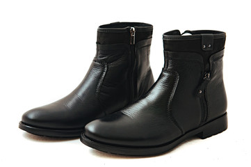 Pair of leather men's shoes isolated on white background