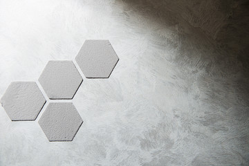 gray stylish grunge cement wall textured background with decorative elements over surface