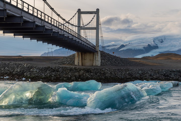 Fototapeta na wymiar View of bridge over the glacial lake Jökulsárlón, South Coast, Iceland