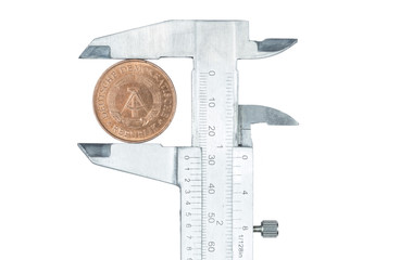 DDR coin is pressed in the caliper